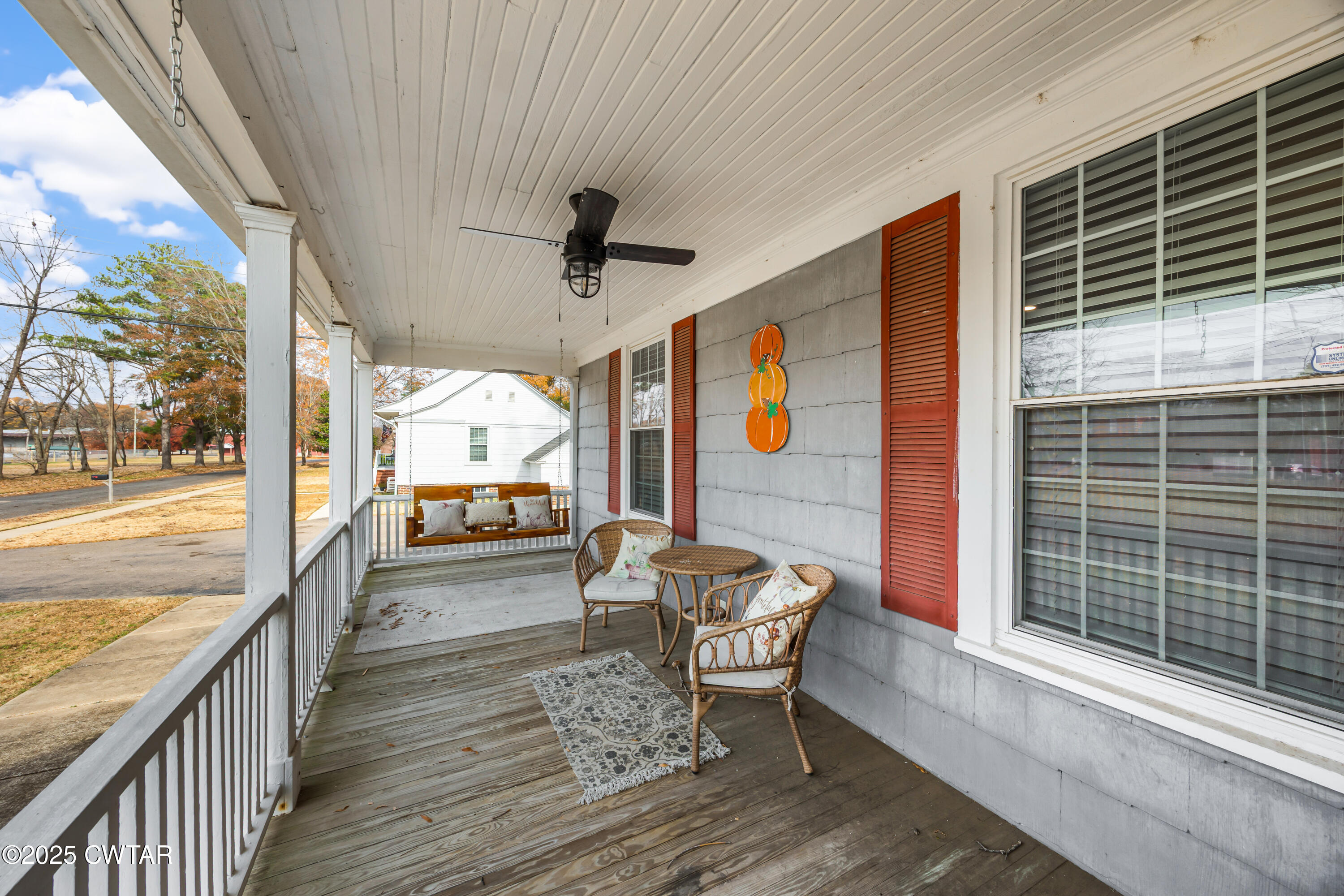 7 Herron Street Jackson, TN 38301 - Photo 2 of 19 a outdoor space with patio the couch and wooden floor