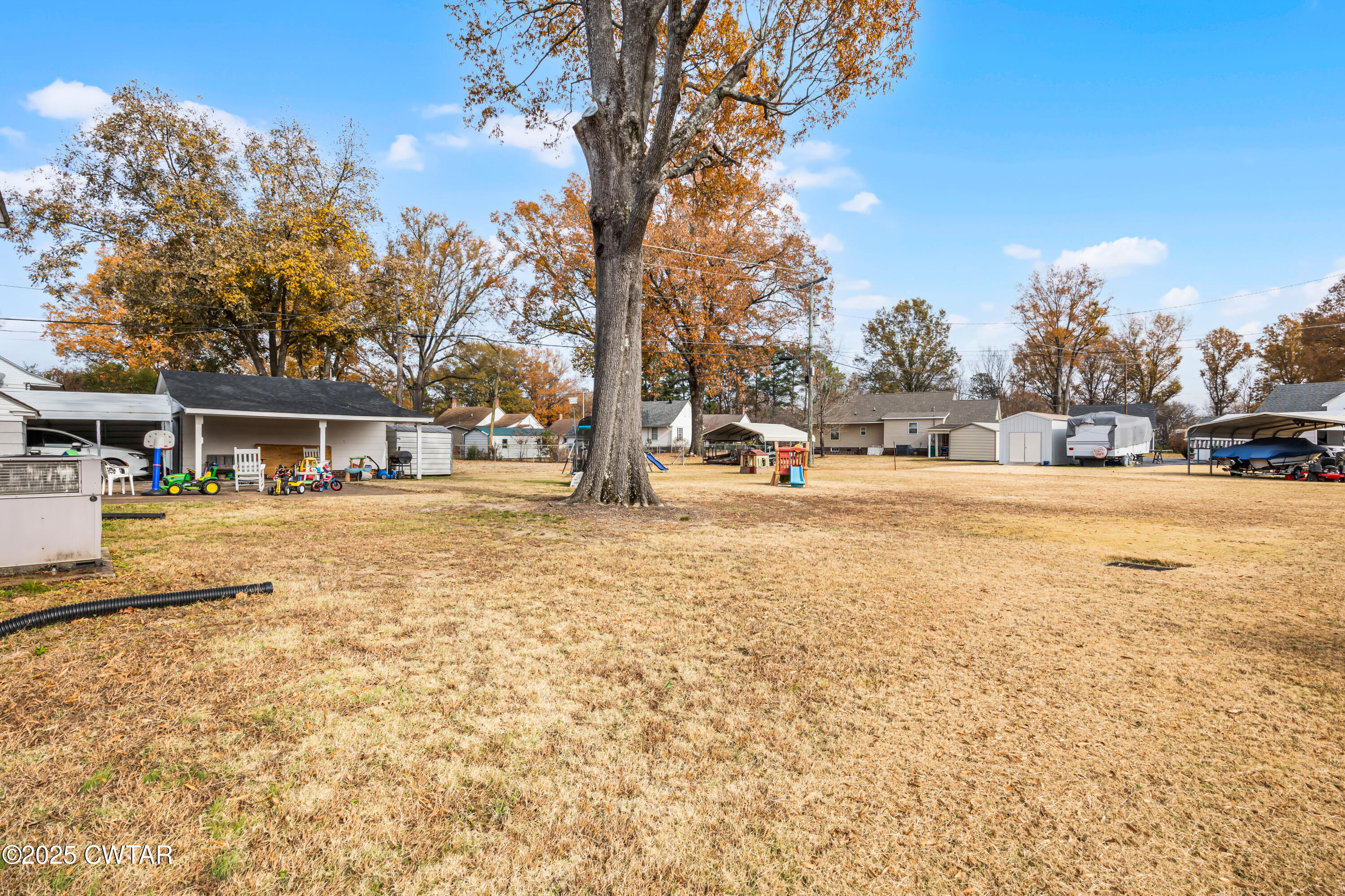 7 Herron Street Jackson, TN 38301 - Photo 4 of 19 a view of outdoor space with swimming pool and patio