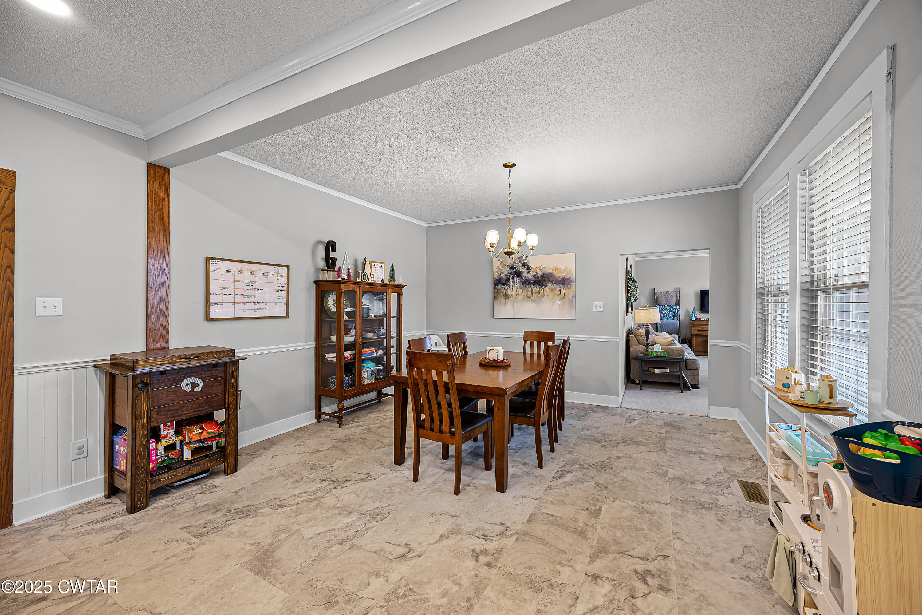 7 Herron Street Jackson, TN 38301 - Photo 8 of 19 a view of a dining room with furniture and chandelier