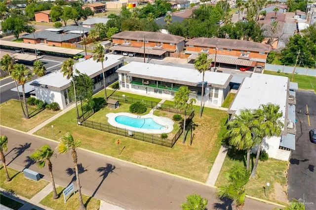 a view of a swimming pool with a patio