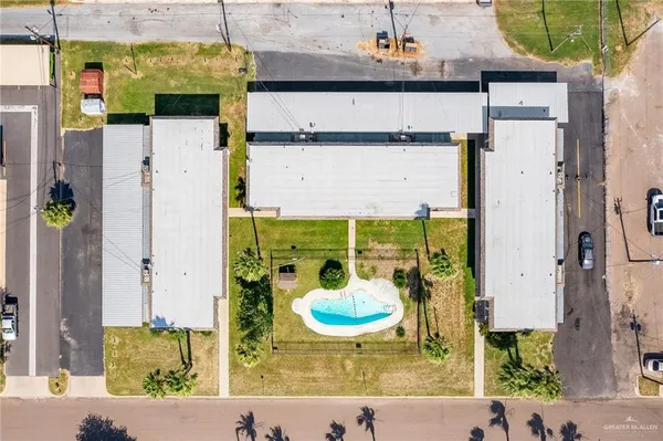 a view of a swimming pool with a garden