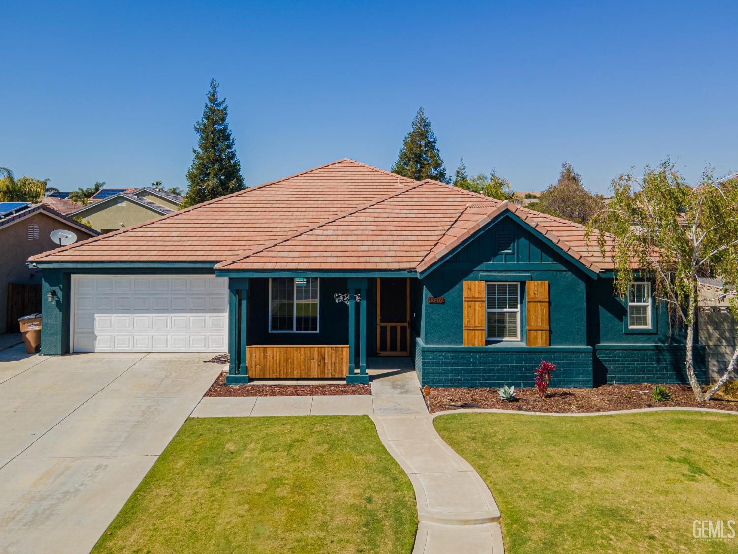 a view of swimming pool with a lounge chairs