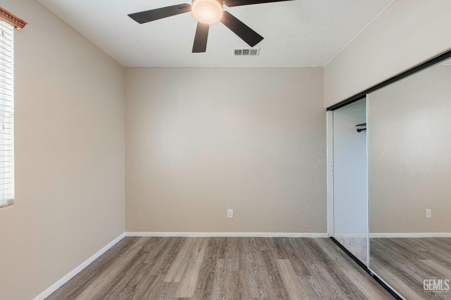 Undisclosed Address Bakersfield, CA 93312 - Photo 22 of 44 an empty room with a workspace