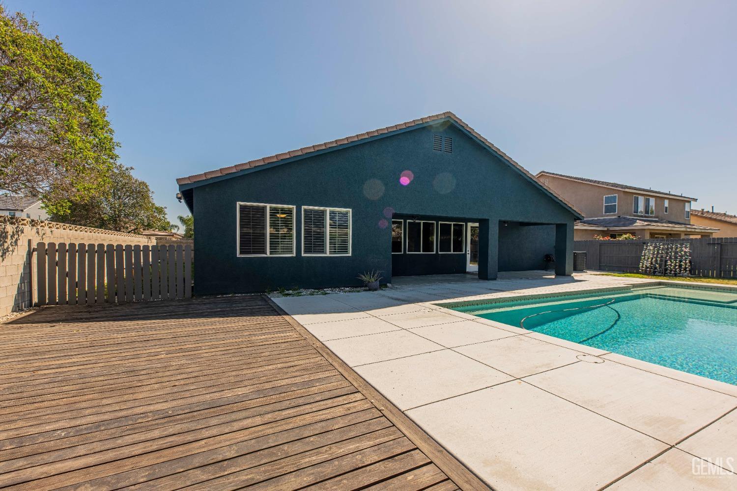 Undisclosed Address Bakersfield, CA 93312 - Photo 39 of 44 a front view of a house with a yard