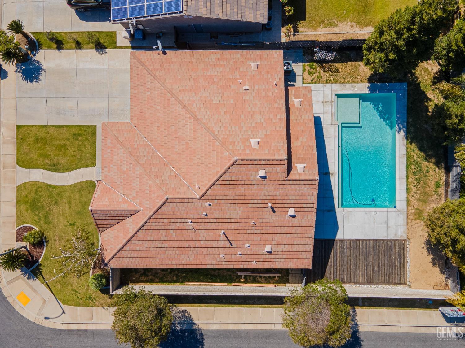 Undisclosed Address Bakersfield, CA 93312 - Photo 44 of 44 a front view of a house with a yard