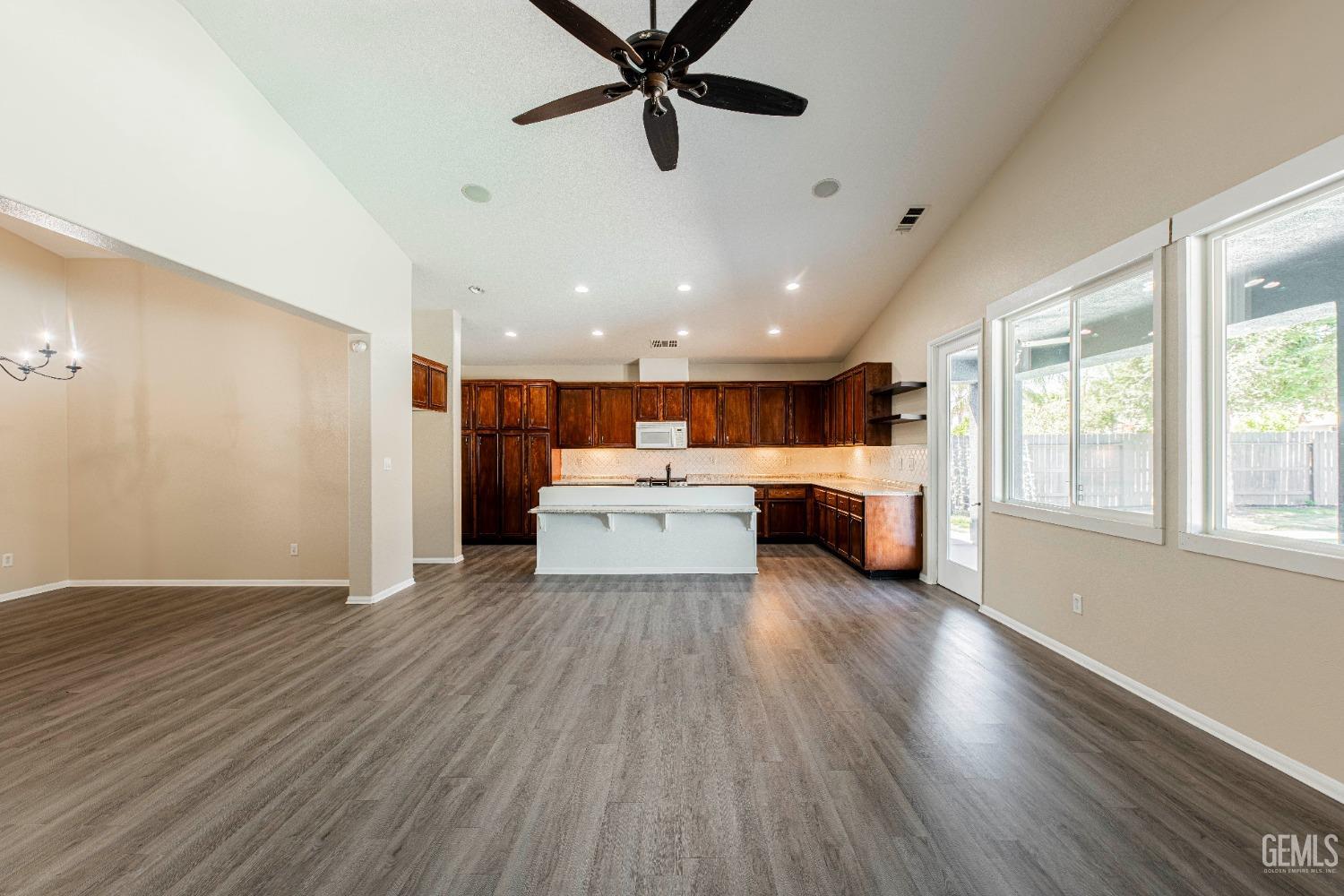 Undisclosed Address Bakersfield, CA 93312 - Photo 10 of 44 a living room with furniture and a large window