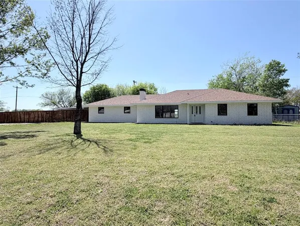 a front view of house with yard