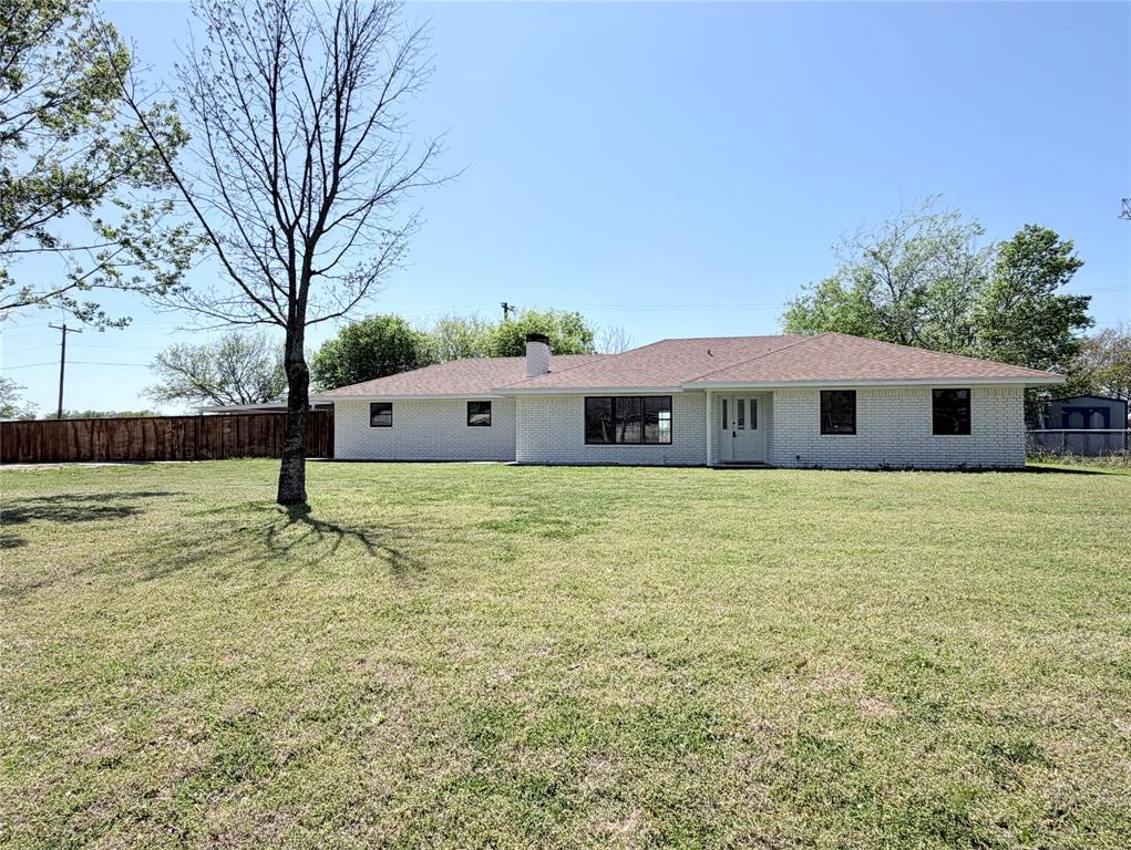 a front view of house with yard