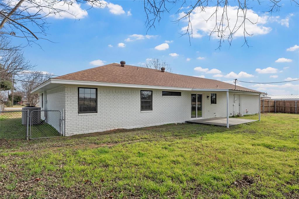 608 South Colorado Street Whitney, TX 76692 - Photo 26 of 26 a view of a house with a yard