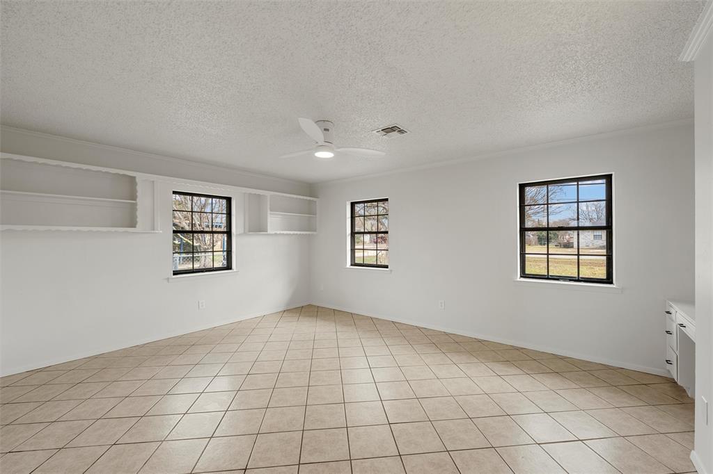 608 South Colorado Street Whitney, TX 76692 - Photo 3 of 27 a view of an empty room with a window
