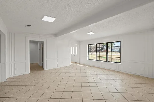 a view of an empty room with window