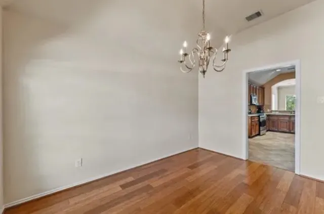 a view of a chandelier in a room