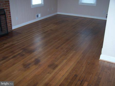 5709 Fisher Road Temple Hills, MD 20748 - Photo 6 of 17 Refinished Hardwood Floors