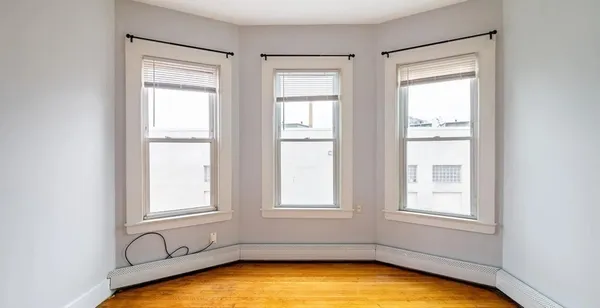 a view of a room with windows