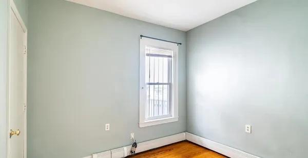 a view of a room that has a window in it