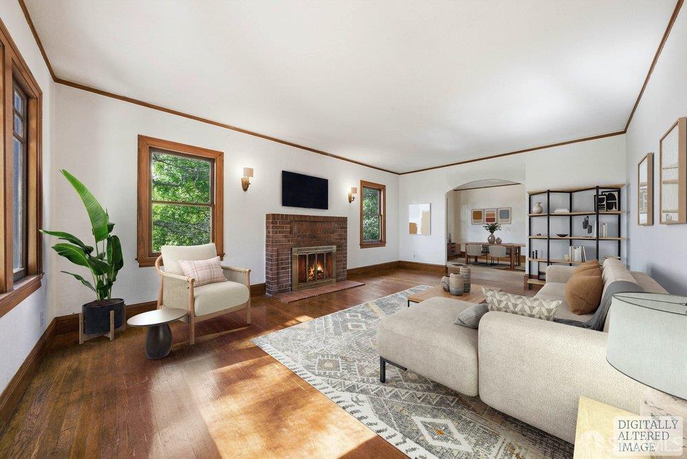 451 Vincente Avenue Berkeley, CA 94707 - Photo 14 of 66 a living room with furniture fireplace and a large window