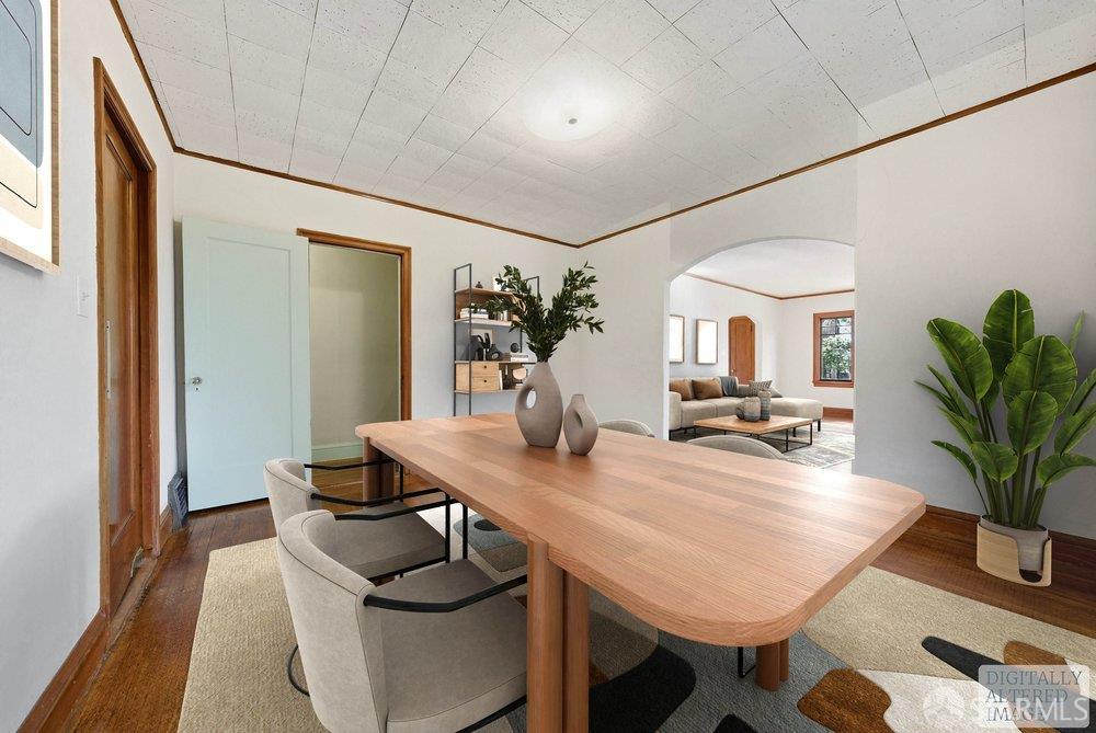 451 Vincente Avenue Berkeley, CA 94707 - Photo 18 of 66 a view of a dining room with furniture and wooden floor