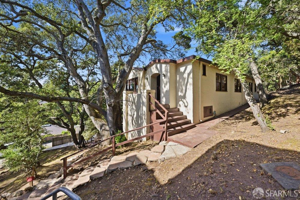 451 Vincente Avenue Berkeley, CA 94707 - Photo 2 of 66 a view of a house with a tree