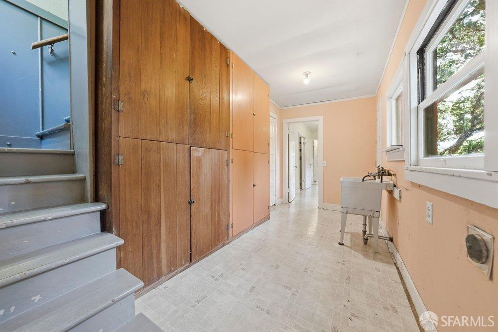 451 Vincente Avenue Berkeley, CA 94707 - Photo 49 of 66 a view of a hallway with wooden floor and staircase