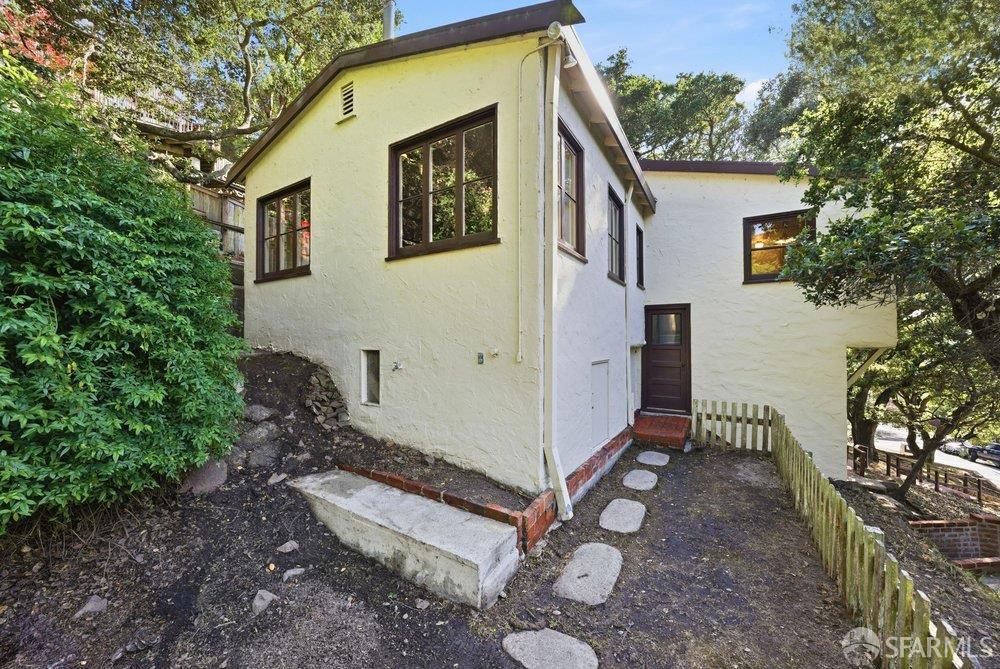 451 Vincente Avenue Berkeley, CA 94707 - Photo 54 of 66 a front view of a house with garden