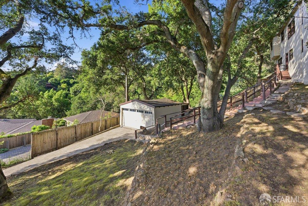 451 Vincente Avenue Berkeley, CA 94707 - Photo 63 of 66 a view of a chairs and table in the backyard