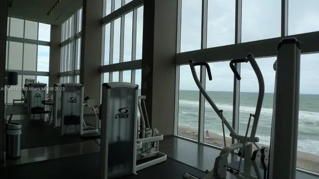 a bathroom with a glass door