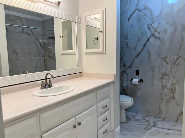 a view of bathroom with a shower