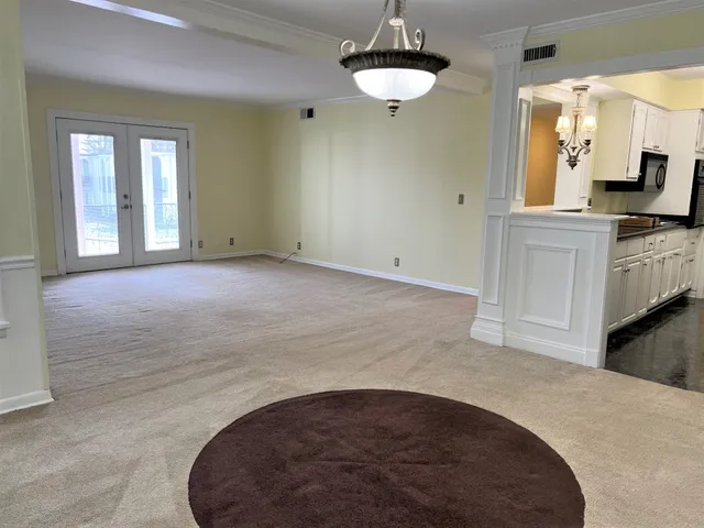 a view of an empty room and window