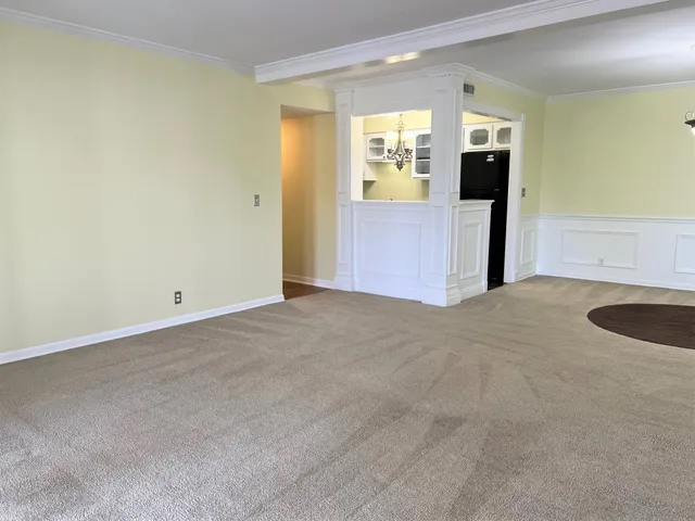 a kitchen with a stove and a microwave