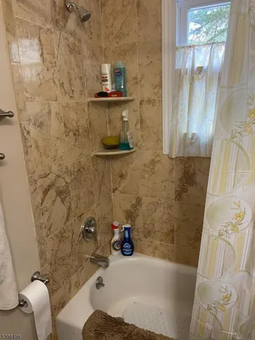a bathroom with a sink and a tub