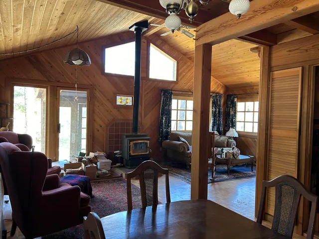 a view of a backyard with a deck