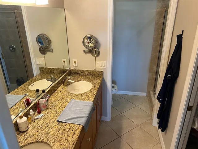 a bathroom with a sink and mirror