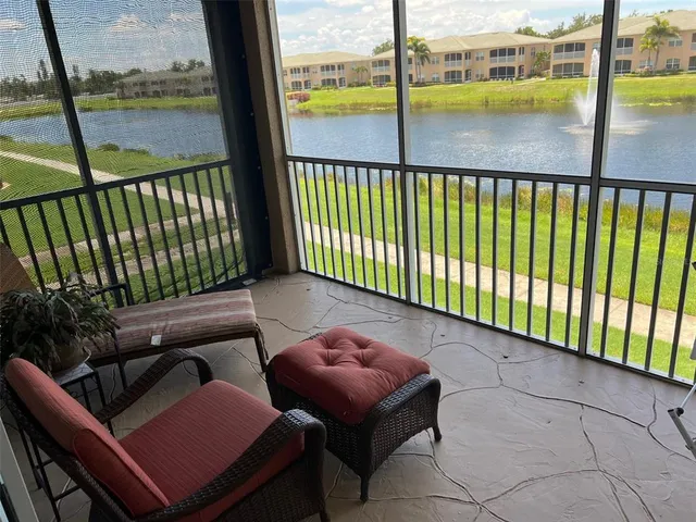 a balcony with wooden floor outdoor seating