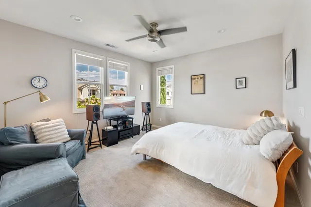 a bedroom with a bed and furniture