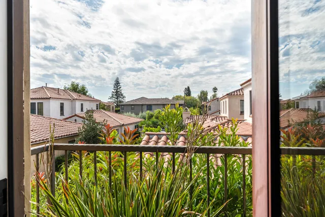 a view of a building from a balcony