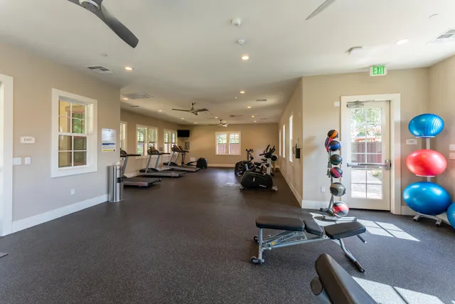 a view of a room with gym equipment