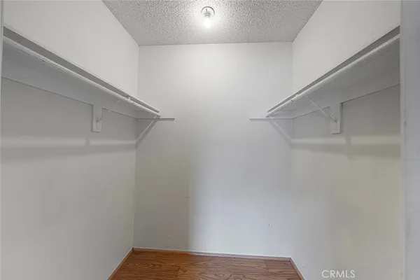 a view of an empty walk in closet