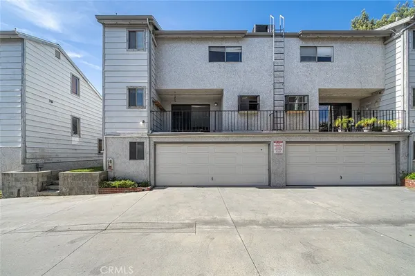 an aerial view of residential house with outdoor space