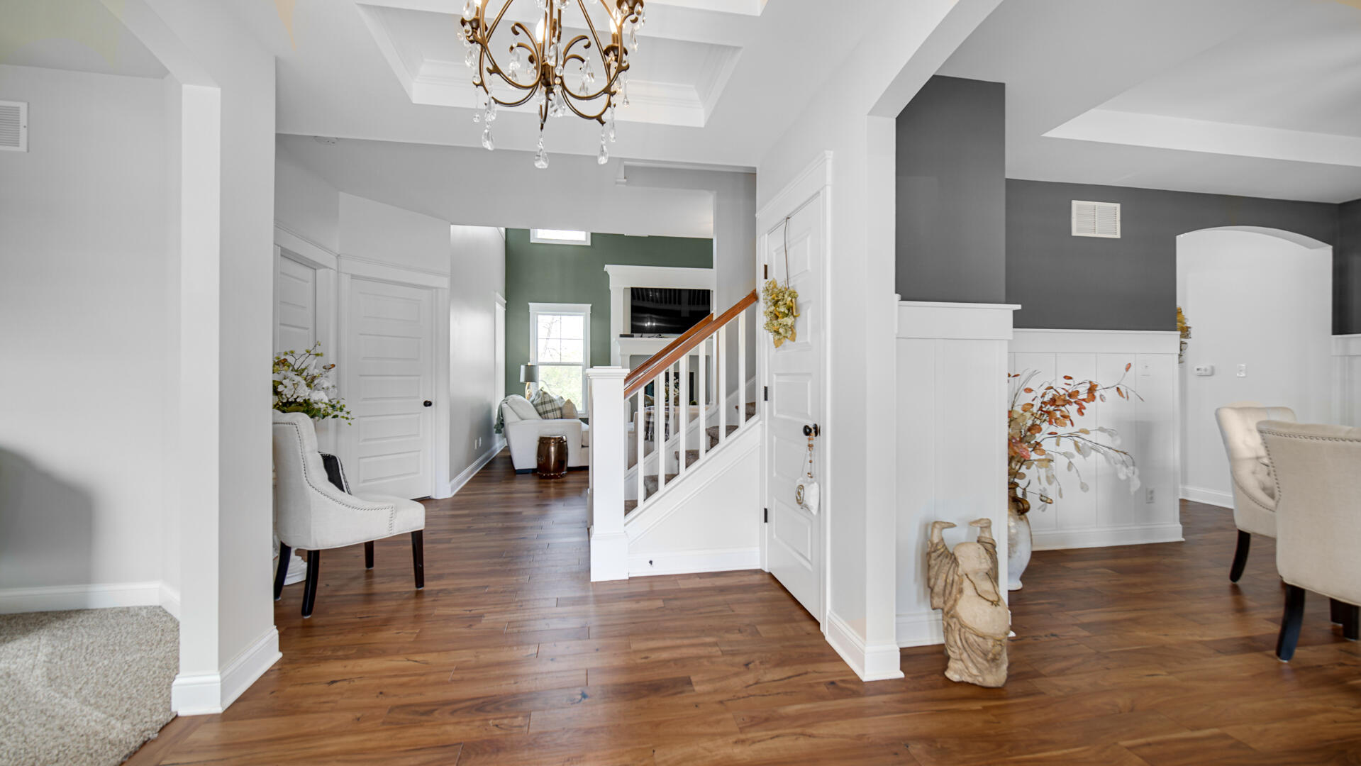12871 Baker Court Crown Point, IN 46307 - Photo 7 of 50 a view of entryway with wooden floor