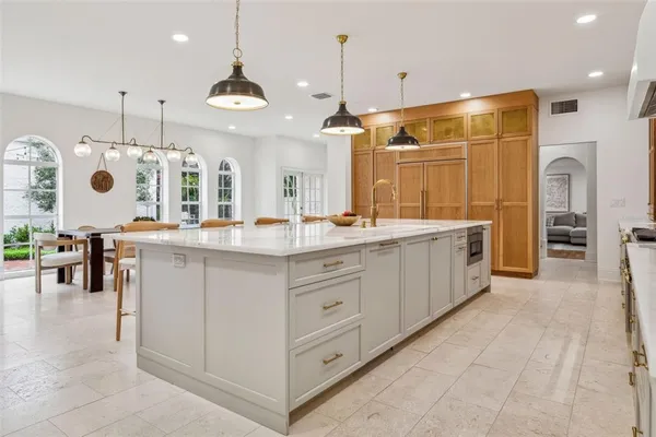 a large kitchen with a large island in it