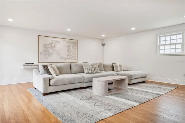 a living room with furniture and a couch