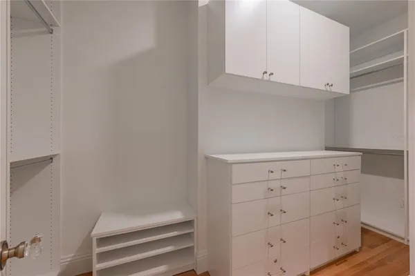 a view of an empty walk in closet