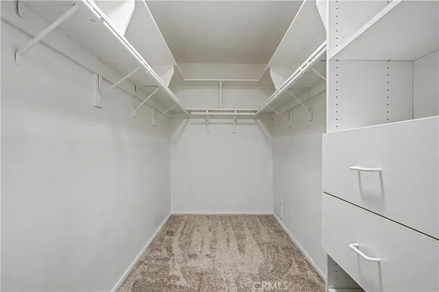 a view of a balcony with wooden floor