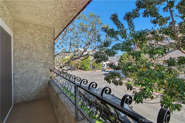 a view of a porch with seating space