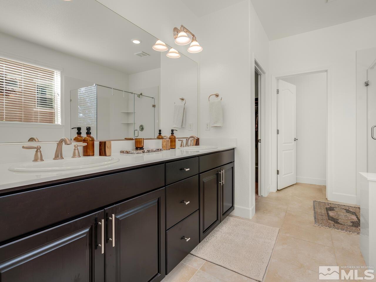 1770 Scott Valley Road Reno, NV 89523 - Photo 14 of 29 a room with a sink and a mirror