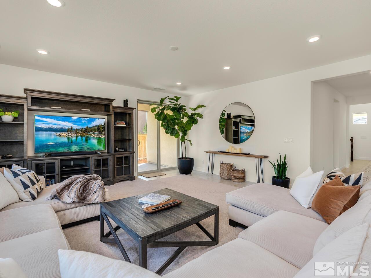 1770 Scott Valley Road Reno, NV 89523 - Photo 5 of 29 a living room with furniture and a flat screen tv