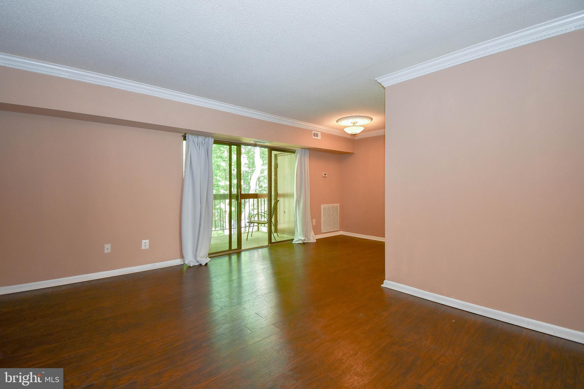 11611 Stoneview Square, Unit 11C Reston, VA 20191 - Photo 11 of 27 living/dining area