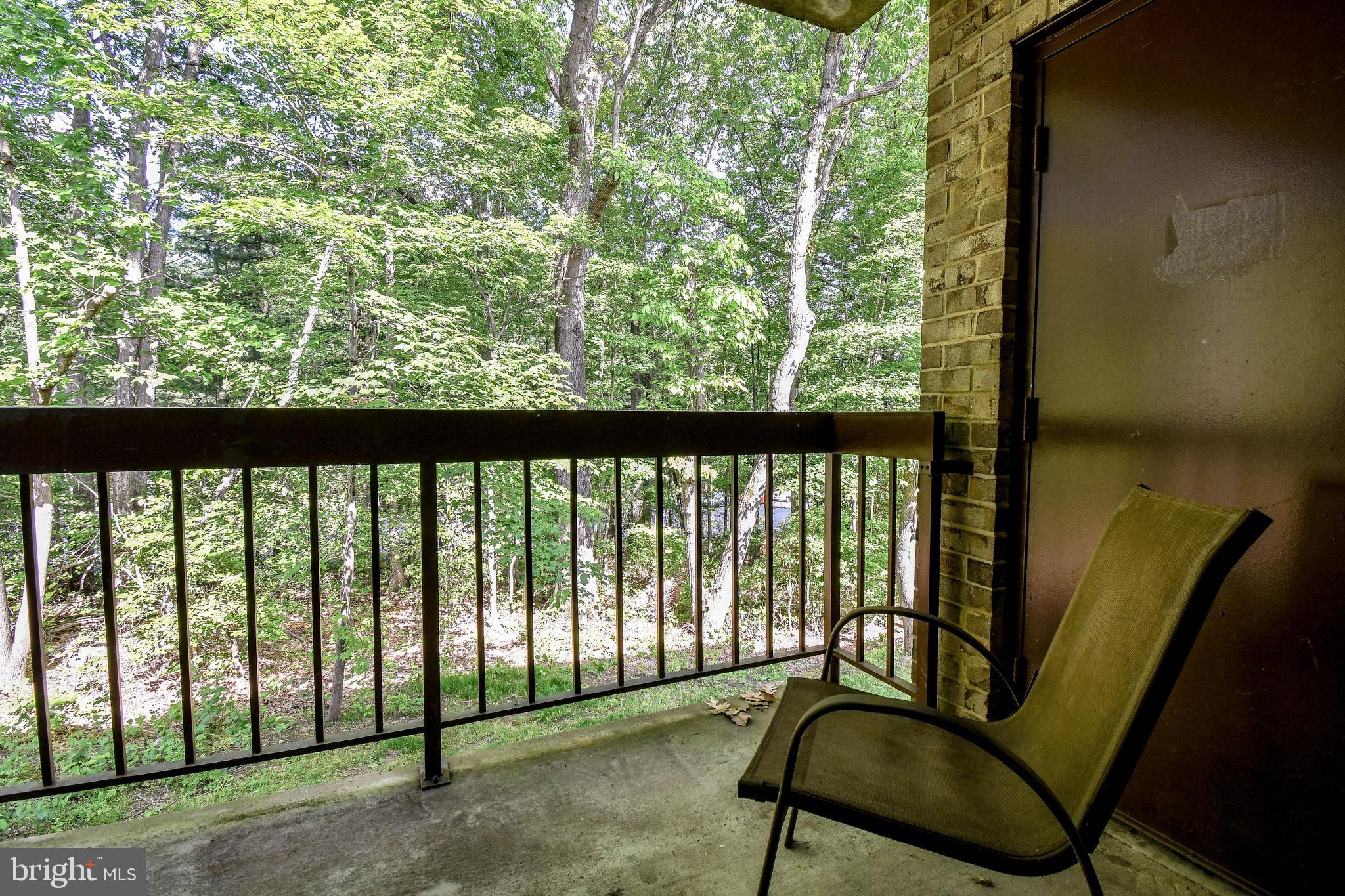 11611 Stoneview Square, Unit 11C Reston, VA 20191 - Photo 27 of 27 Private balcony overlooking trees