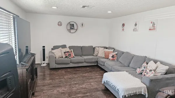 a living room with furniture and a couch