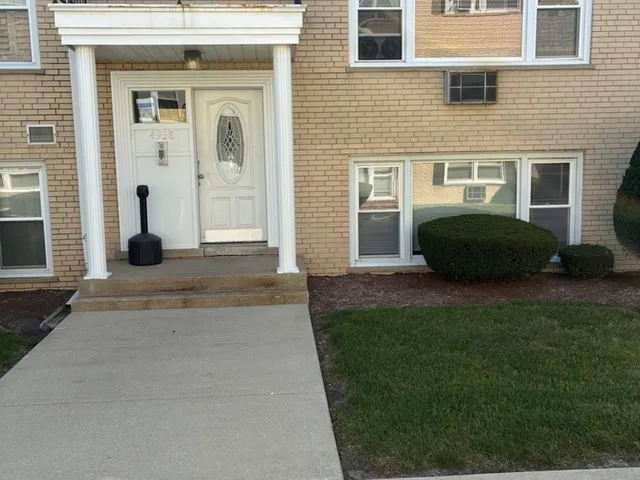 a house view with a garden space